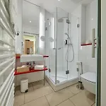 ホテル Strandhotel Vierjahreszeiten 4*